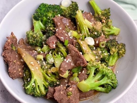 paleo beef and broccoli in a white bowl